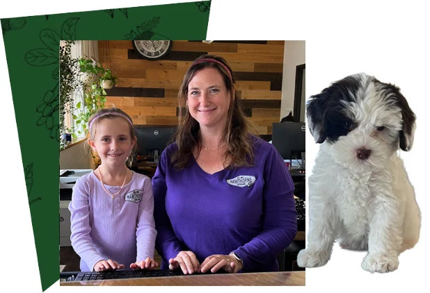 Original website photograph: A family visiting Hawthorne Auto Clinic and Runa the shop dog